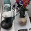 Several different vases of varying shapes and sizes are seen here..jpg